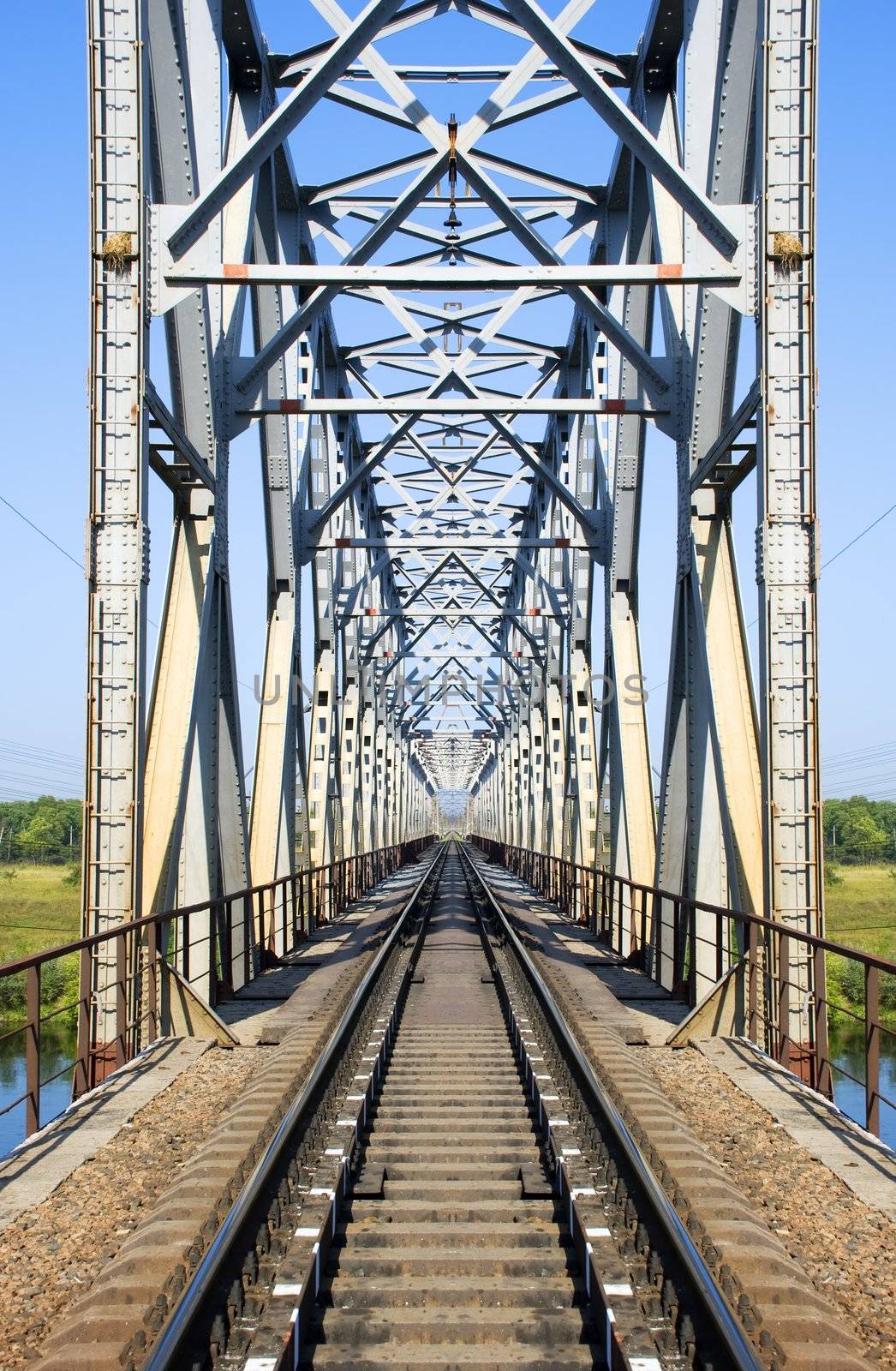 The railway bridge through the river. East Ukraine. The river - Severski Donets