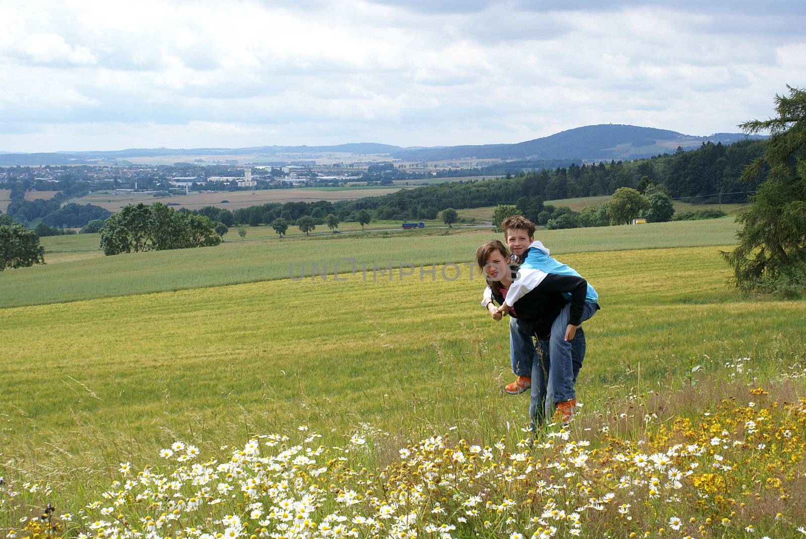 Kids having fun in front of great view.                 