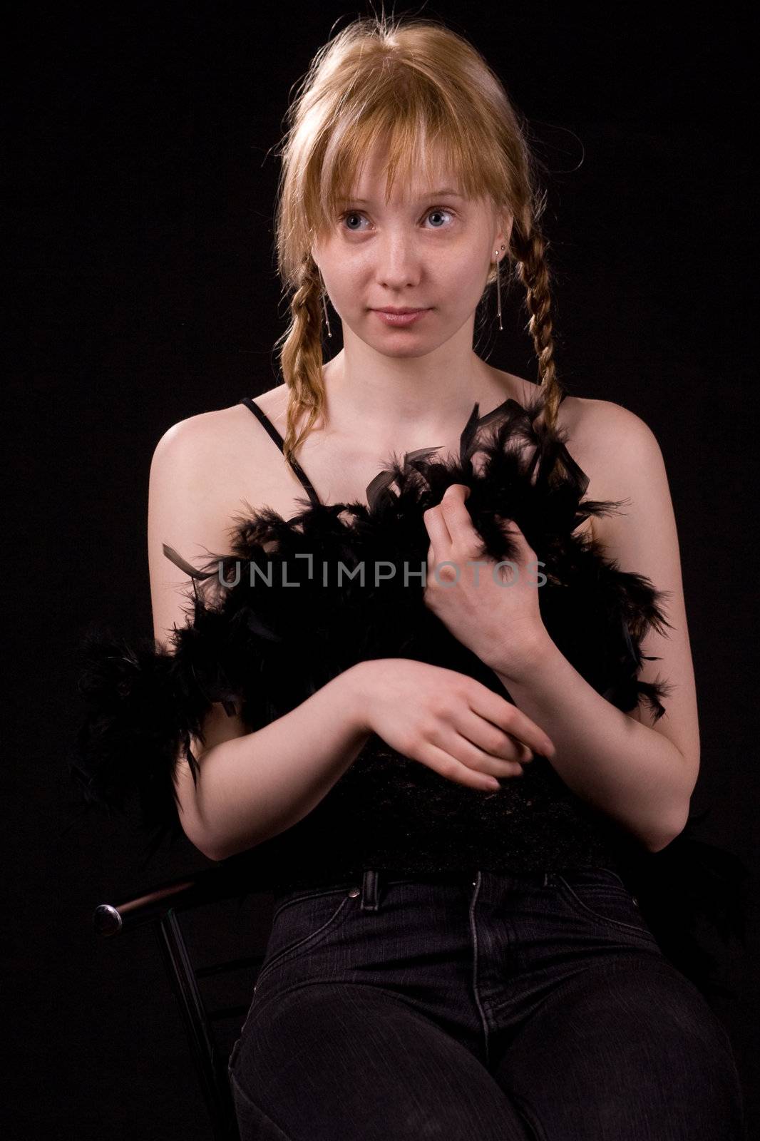 blonde girl on black with boa
