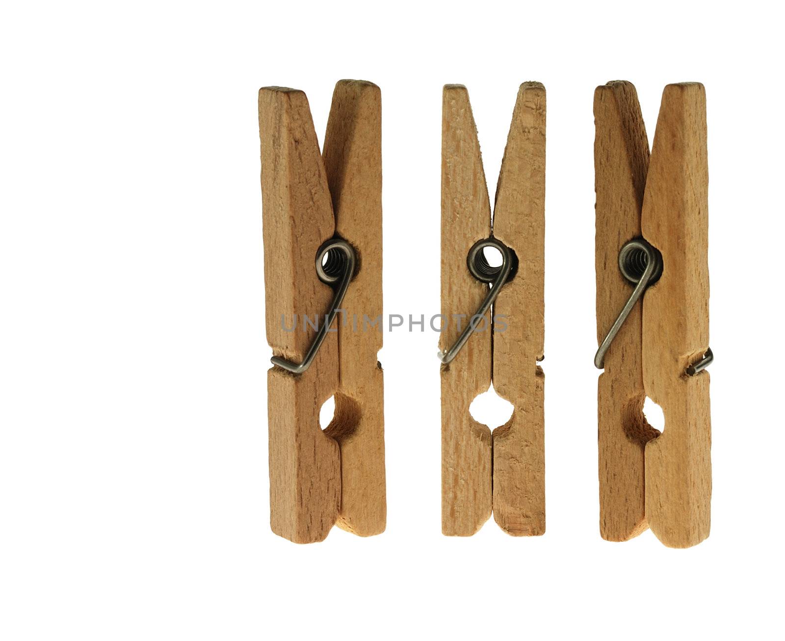 Linen clothespins isolated on a white background