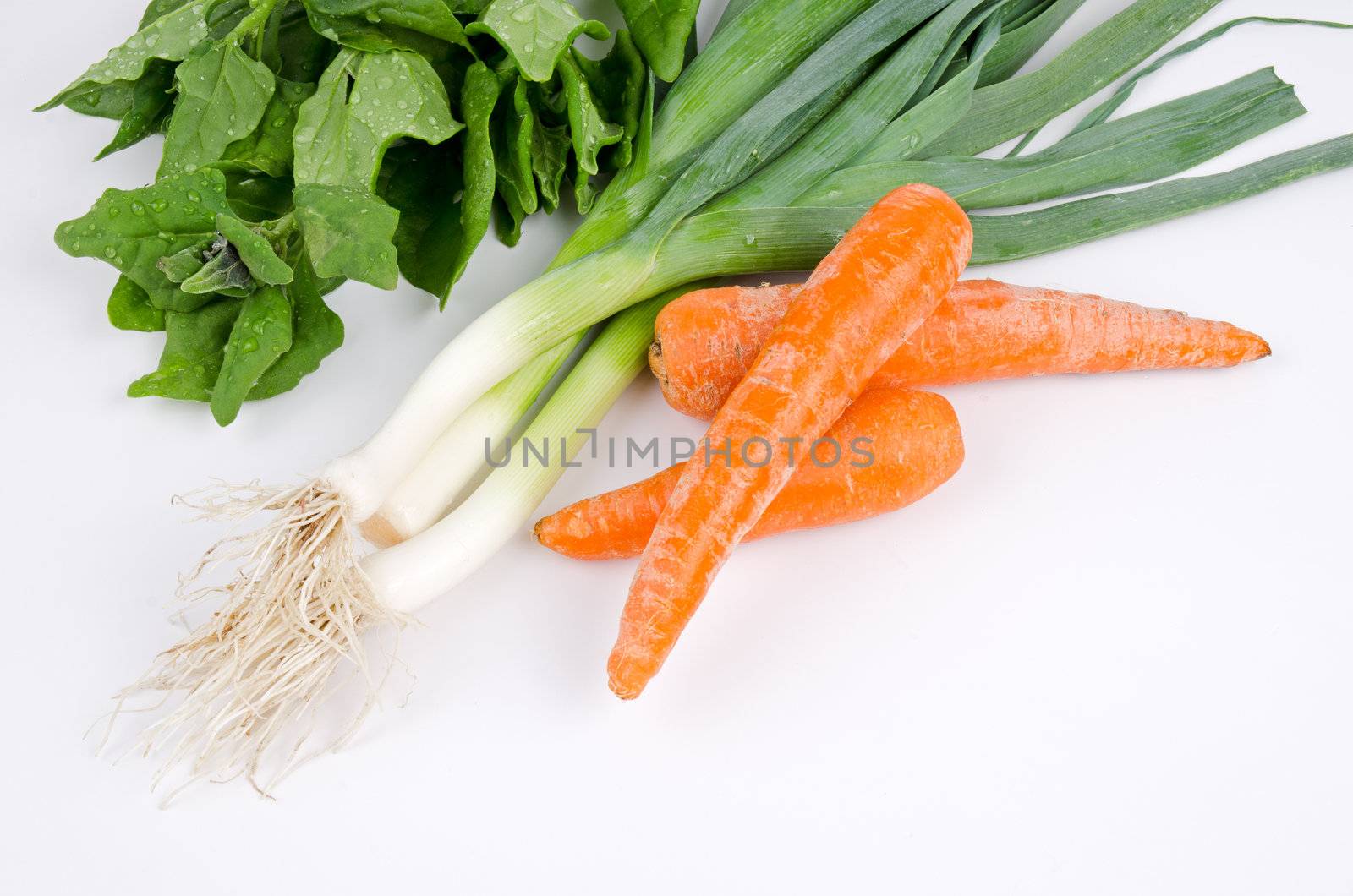 Fresh vegetables on white background.