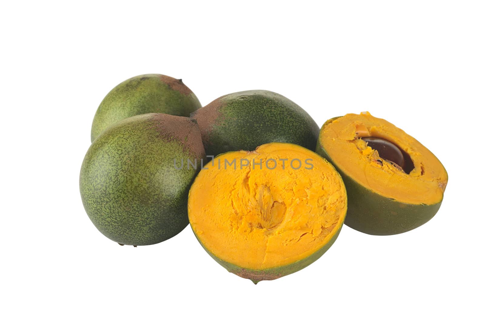 Fruit called Lucuma (lat. Pouteria lucuma) grown in the Andean region of Peru, which is very popular in Peru (Isolated on White) (Selective Focus, Focus on the front)