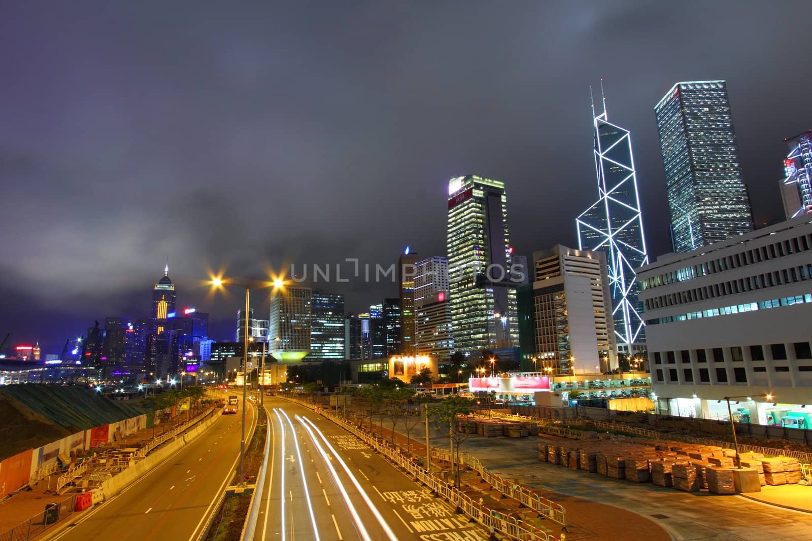 Traffic in Hong Kong city at night by kawing921