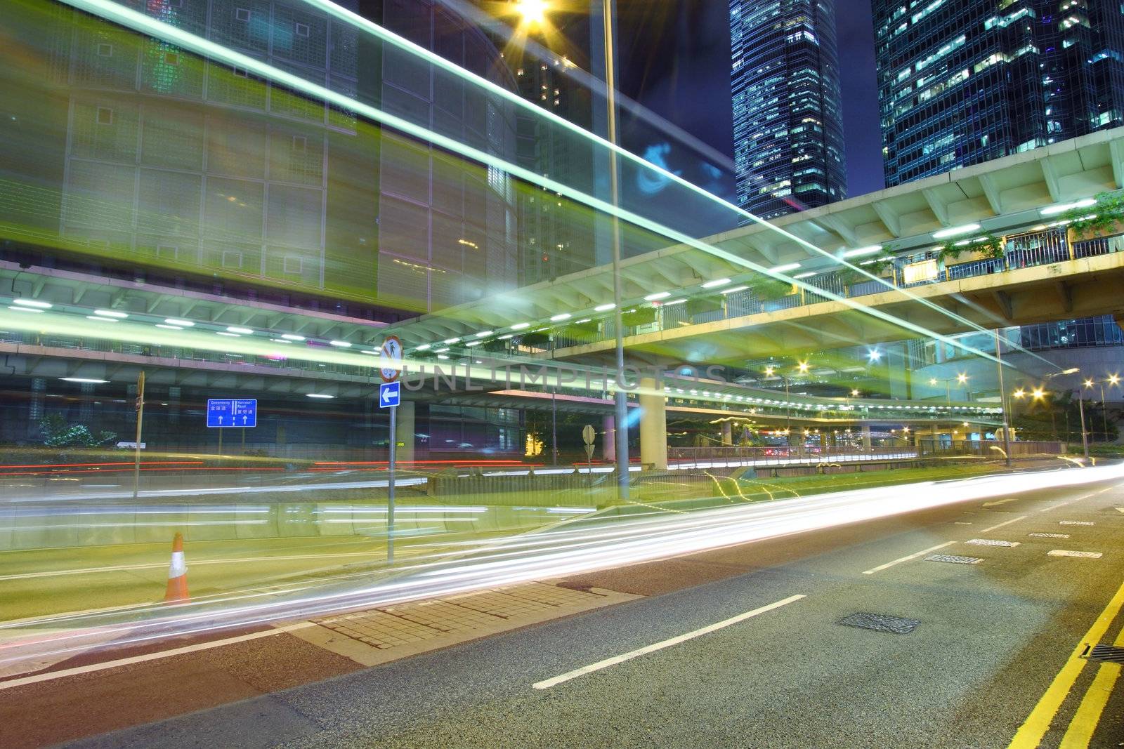 Traffic through downtown of Hong Kong at night by kawing921