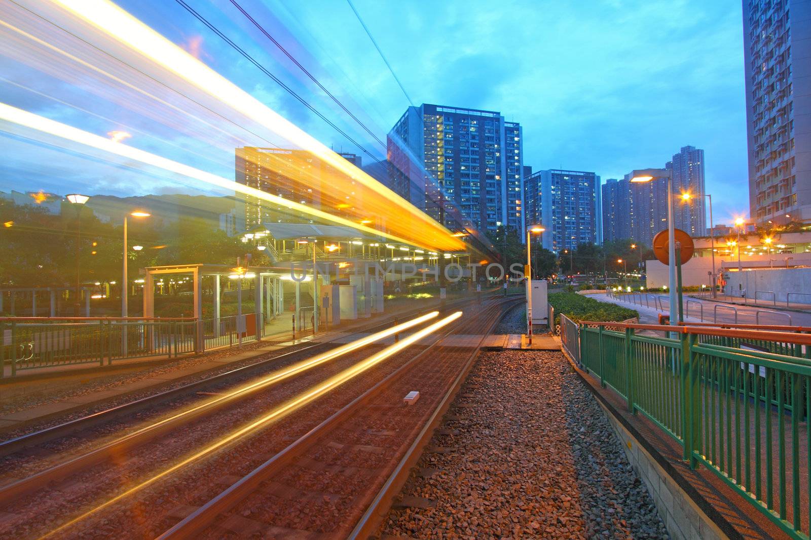 Traffic in Hong Kong at night. Light rail. by kawing921