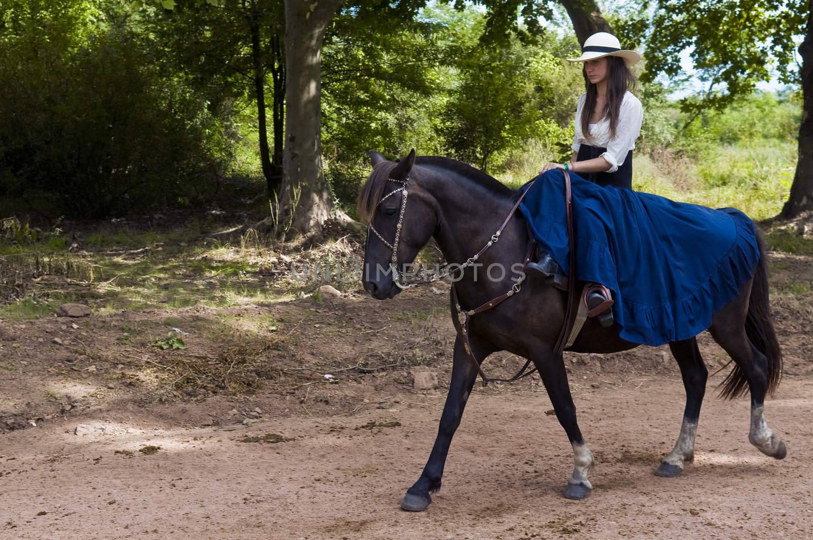 TACUAREMBO, URUGUAY - MAR 5 : Participant in the annual festival "Patria Gaucha" on March 5, 2011 in Tacuarembo, Uruguay. It is one of the biggest festival in South America to celebrate gaucho culture