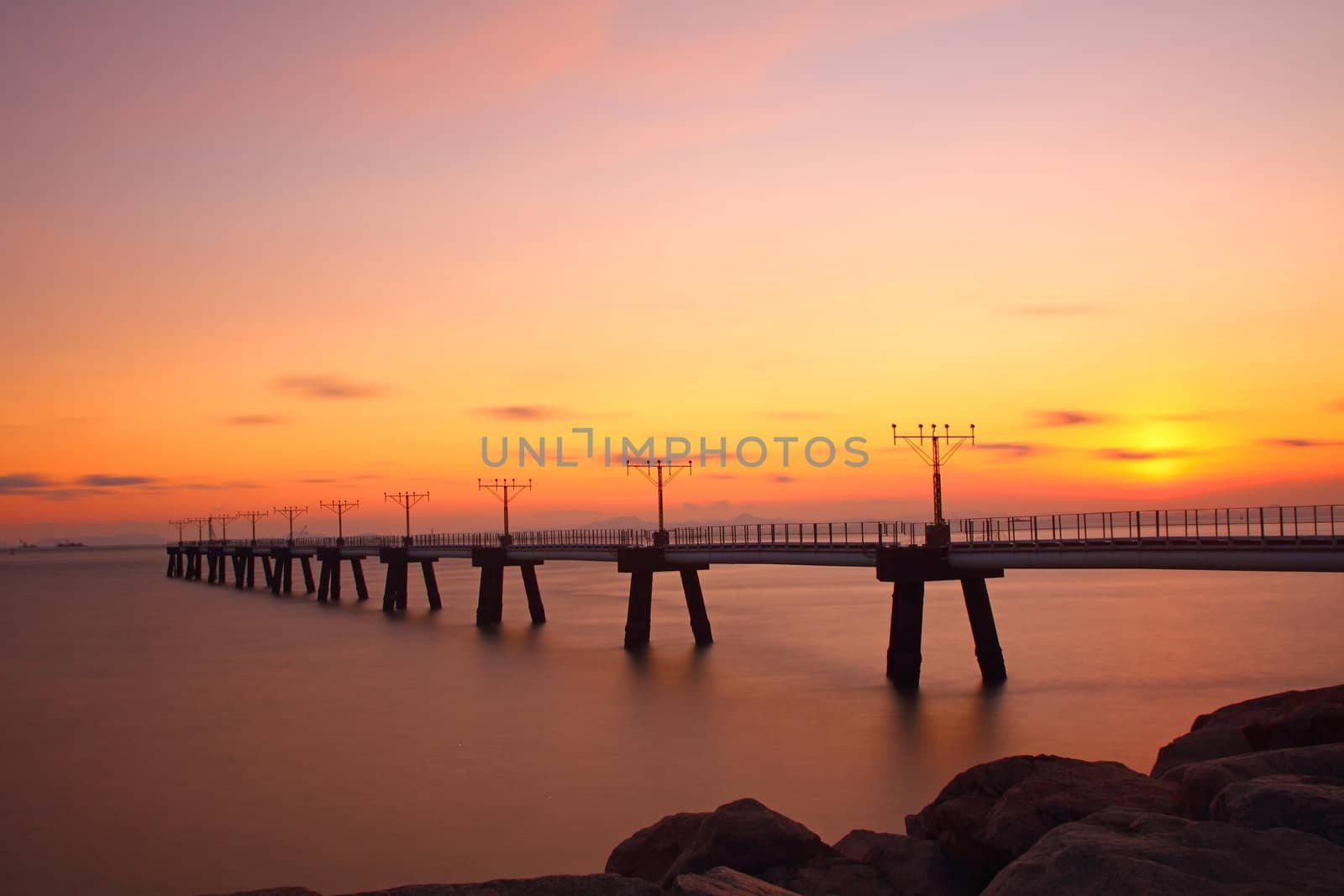 Sunset at coast of the sea