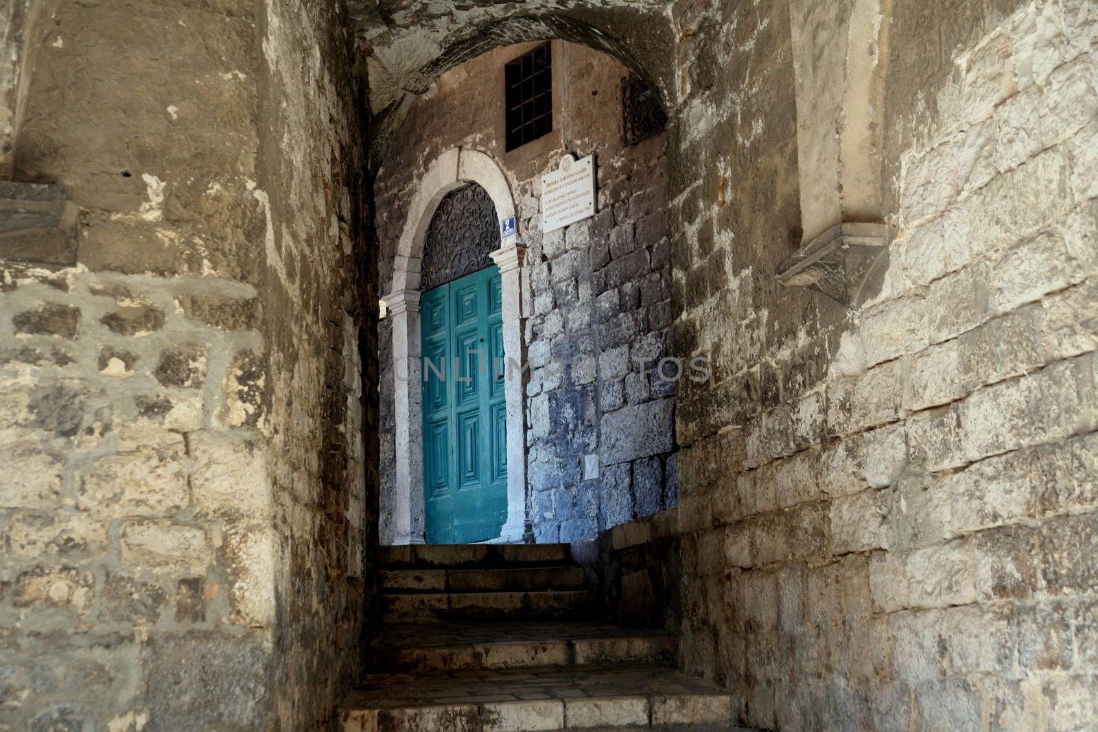 Narrow and old street in Sibenik city, Croatia, medieval zone