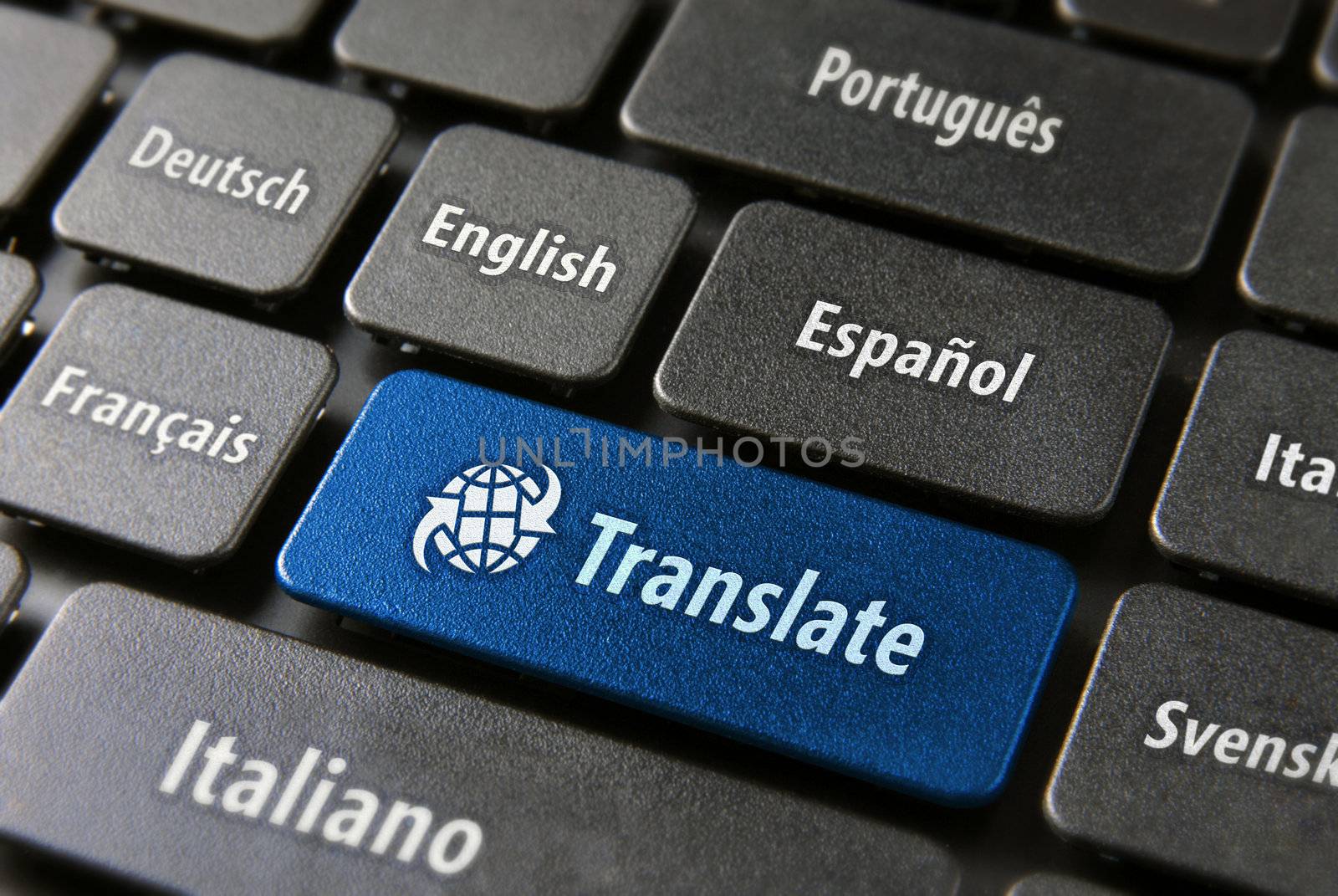 Multilingual translation online concept. Close up of multi language keyboard and translate word key in blue color with clippingpath.