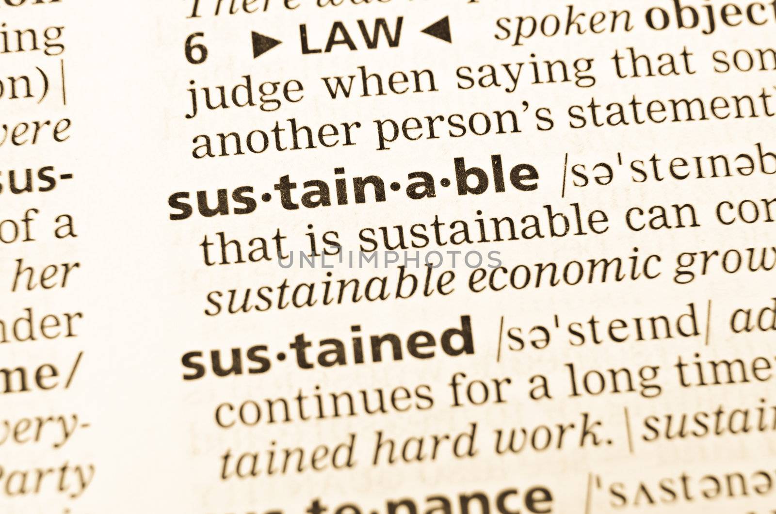 The word sustainable in the old dictionary. Selective focus effect.