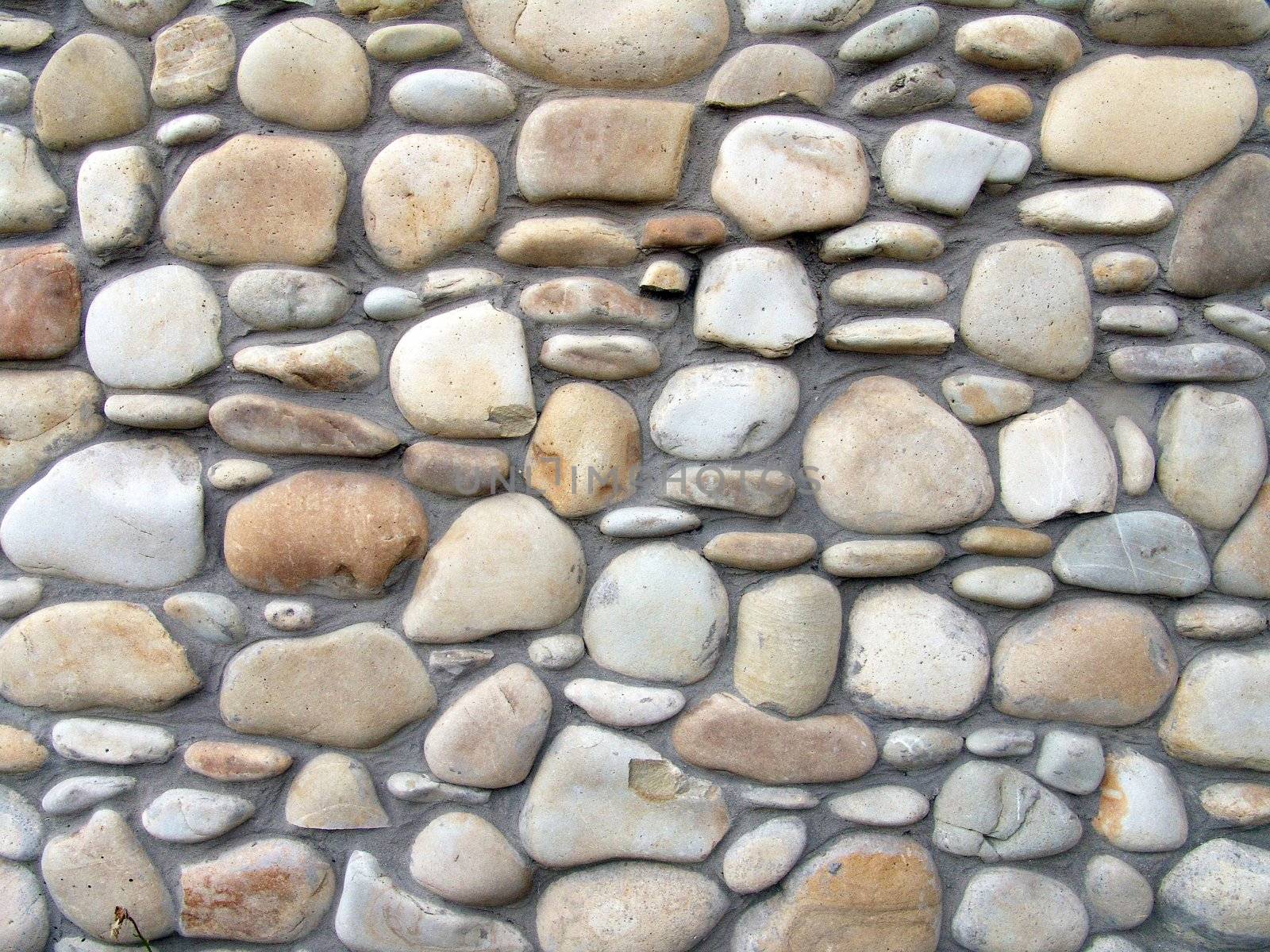 The smooth stone background, design of wall or fence