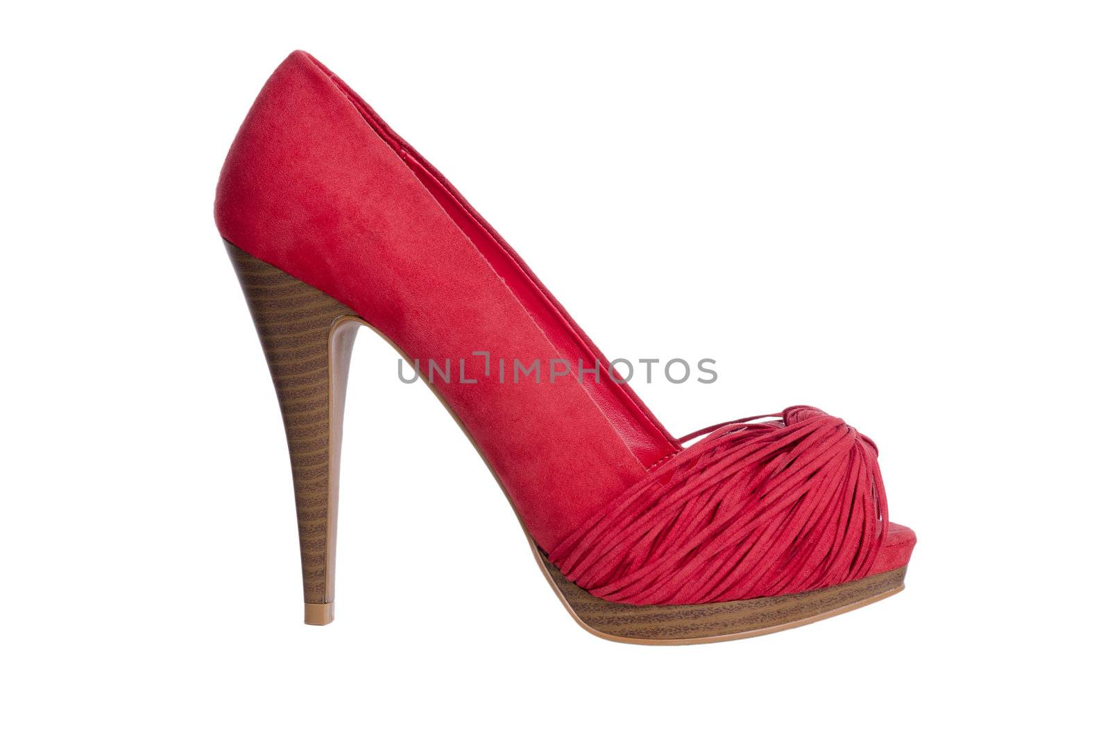 Red high heel women shoe, profile view,  isolated on white background.