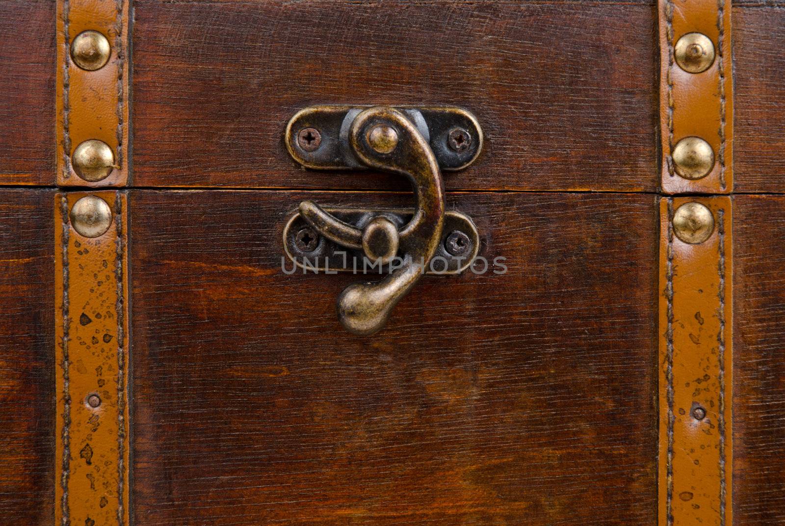 Old coffer with metallic lock.