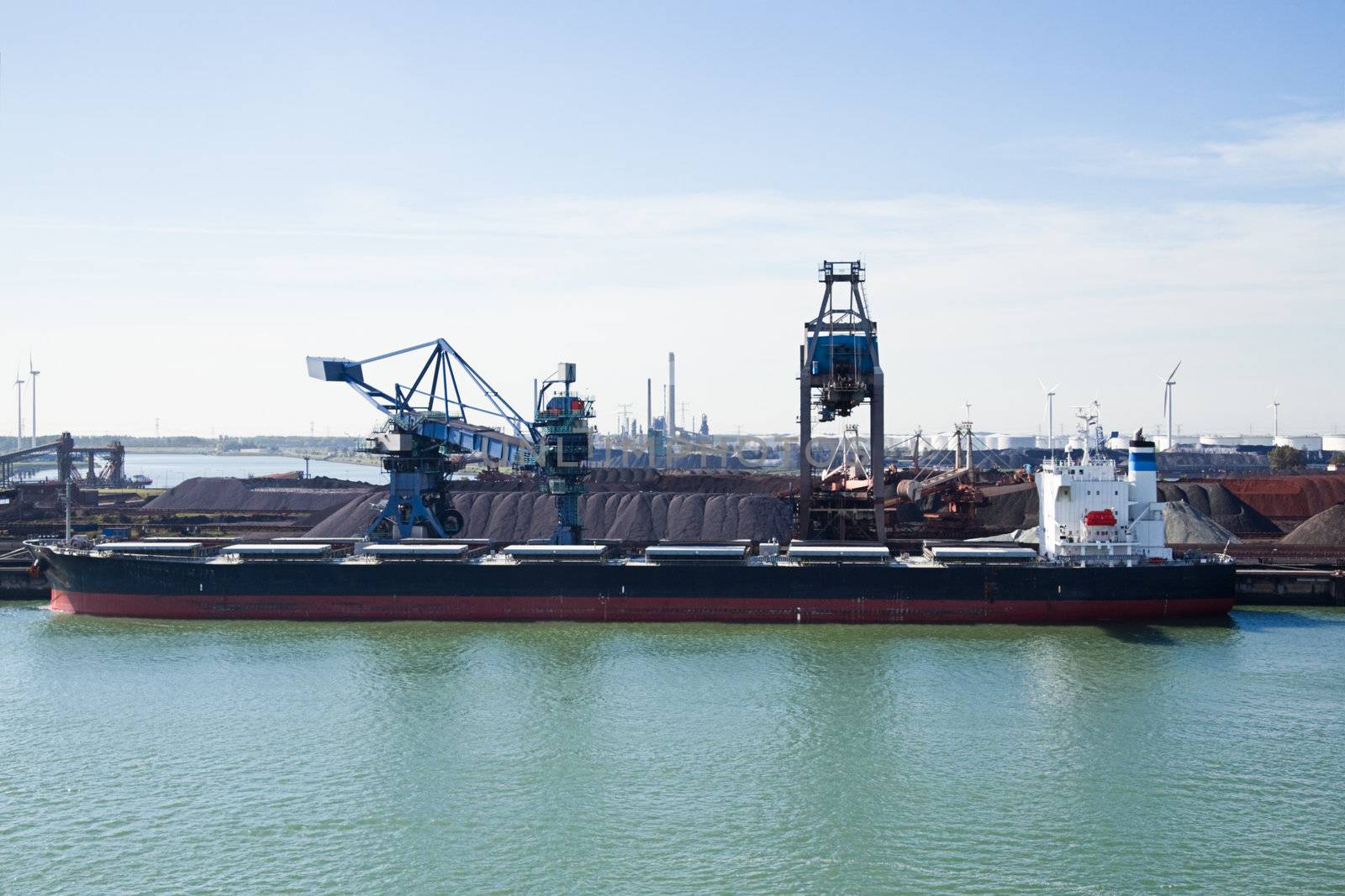 Bauxite transshipment in Rotterdam port by Colette