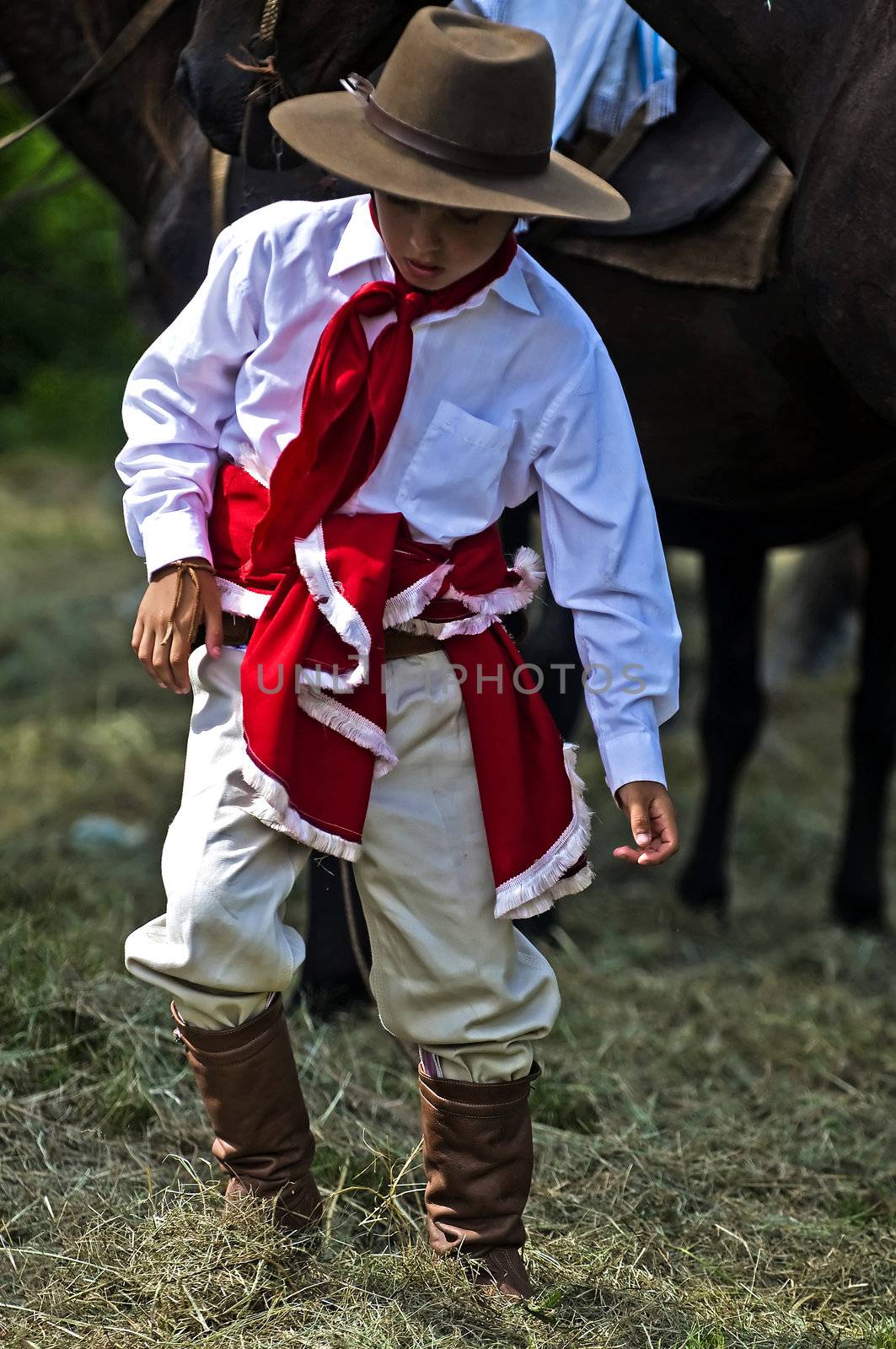 TACUAREMBO, URUGUAY - MAR 5 : Participant in the annual festival "Patria Gaucha" on March 5, 2011 in Tacuarembo, Uruguay. It is one of the biggest festival in South America to celebrate gaucho culture