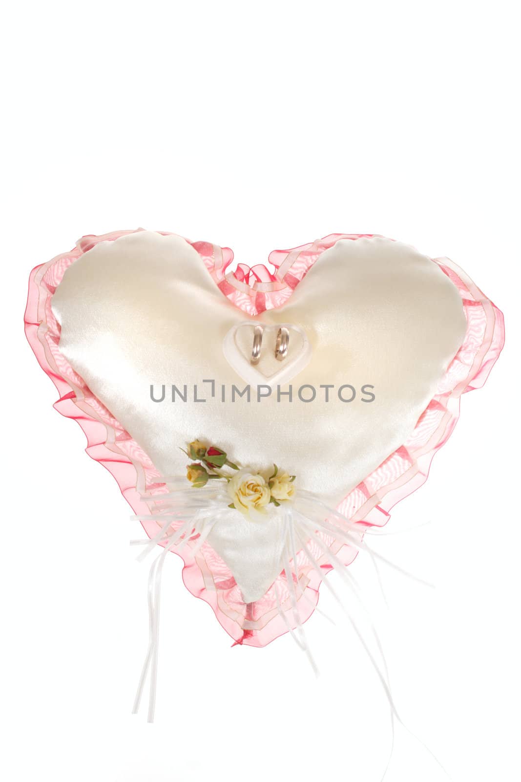 Wedding ornaments, ring on pillow in shape of heart