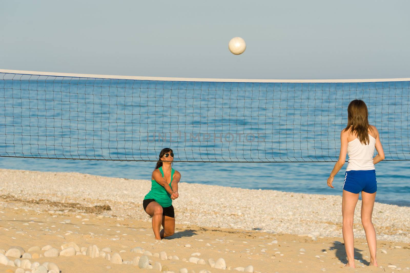 Volleyball match on a sunny Mediterranean beach