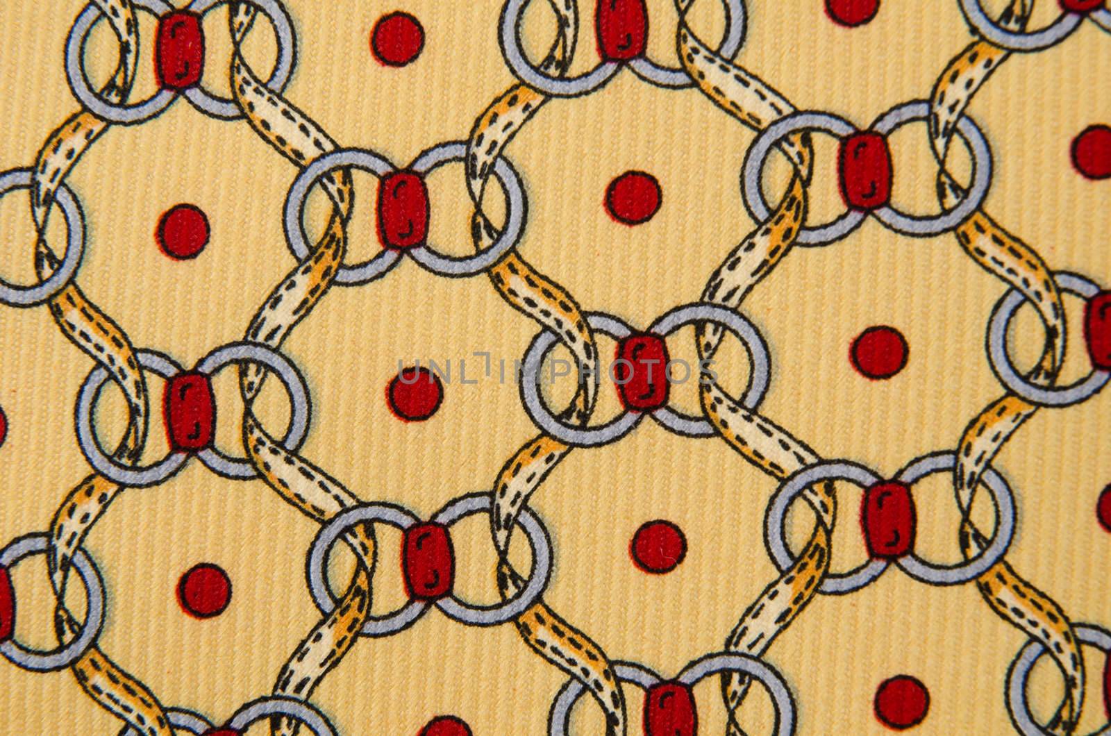 Abstract pattern ornamented textile closeup.