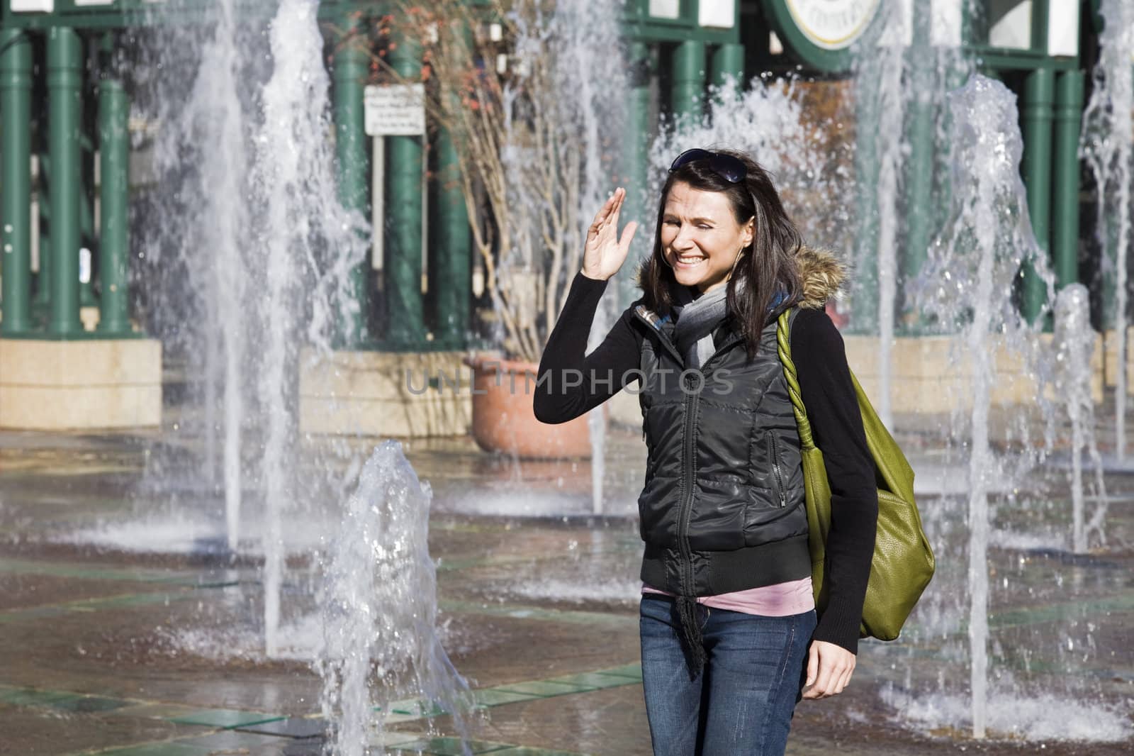 Girl in the fountain square in Memphis, Tennessee, USA.