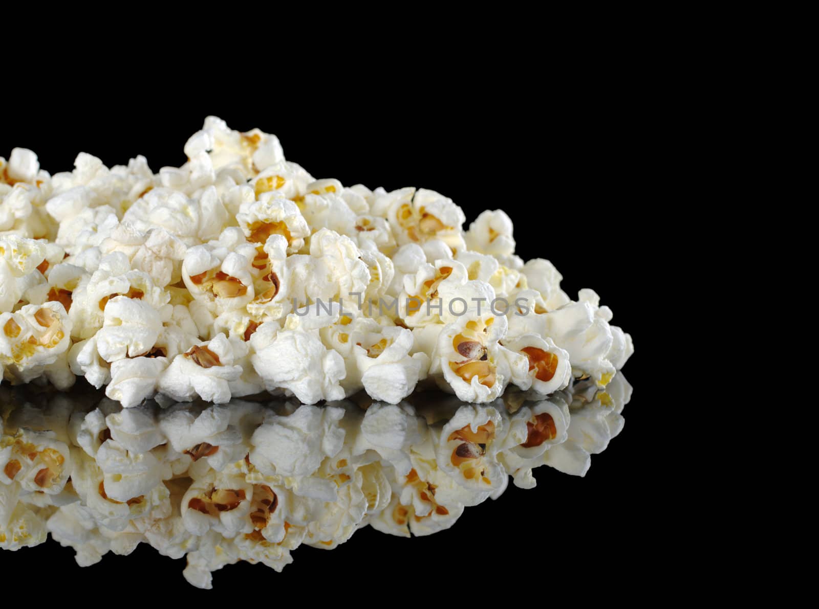 Pile of Popcorn on Black by ildi