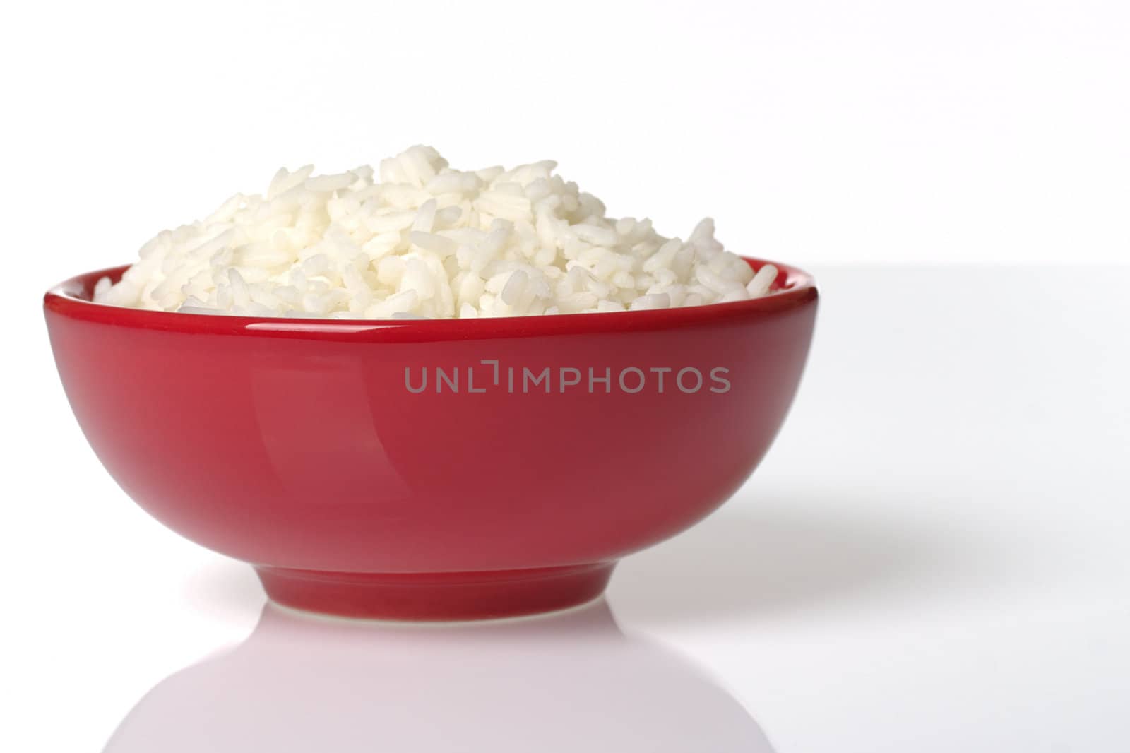 Cooked Rice in Red Bowl by ildi