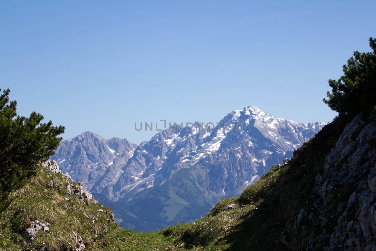 The Alpine mountains of Austria below the warm sun of summer