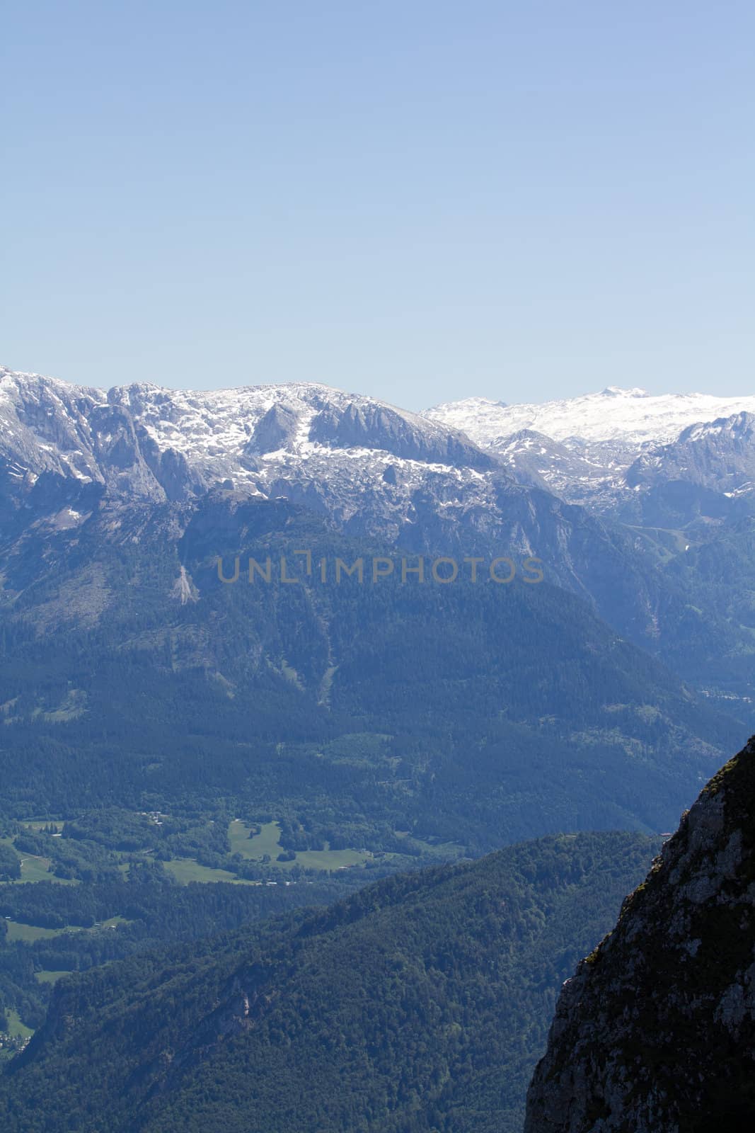The Alpine mountains of Austria below the warm sun of summer