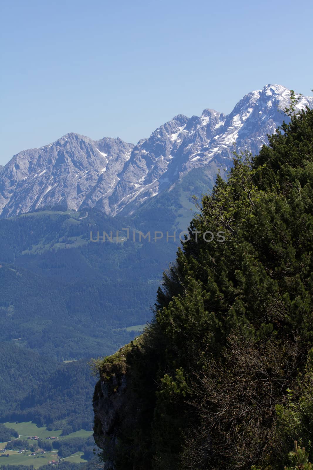 The Alpine mountains of Austria below the warm sun of summer