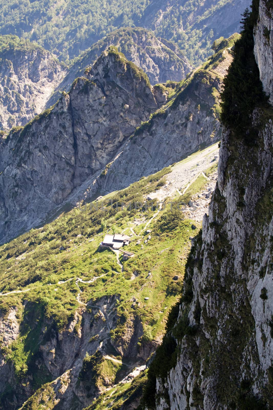 The Alpine mountains of Austria below the warm sun of summer