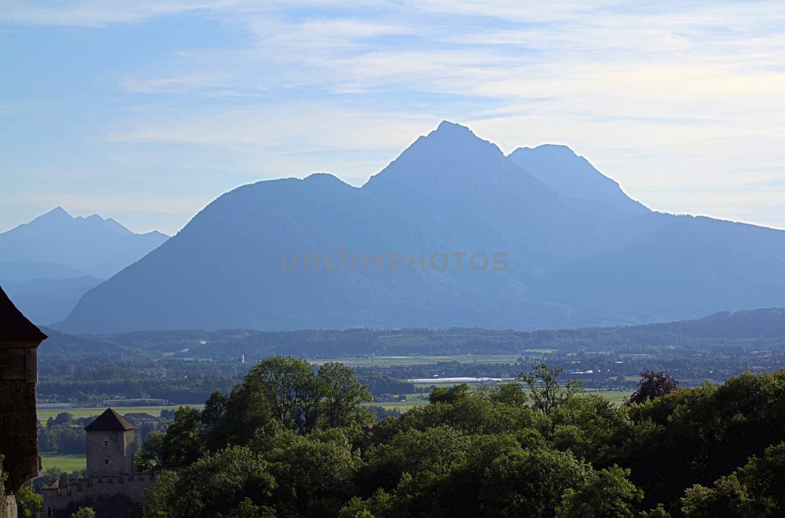 The Alpine mountains of Austria below the warm sun of summer