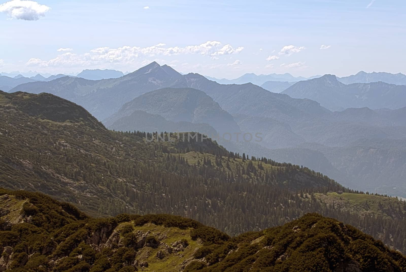The Alpine mountains of Austria below the warm sun of summer