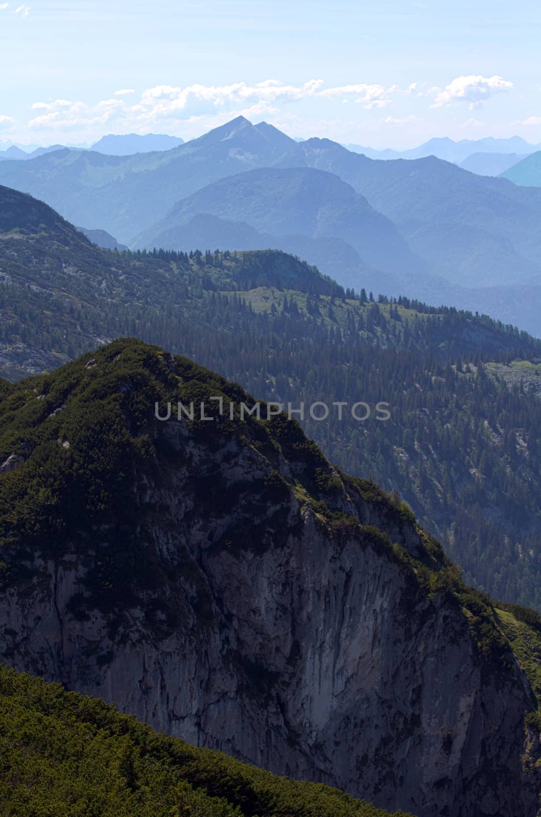 The Alpine mountains of Austria below the warm sun of summer