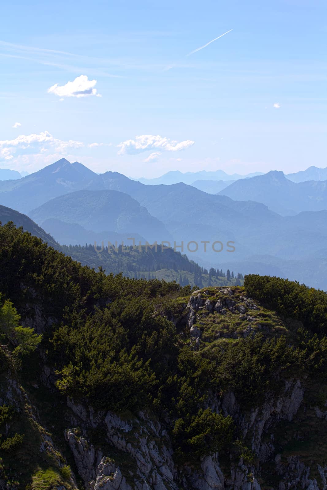 The Alpine mountains of Austria below the warm sun of summer
