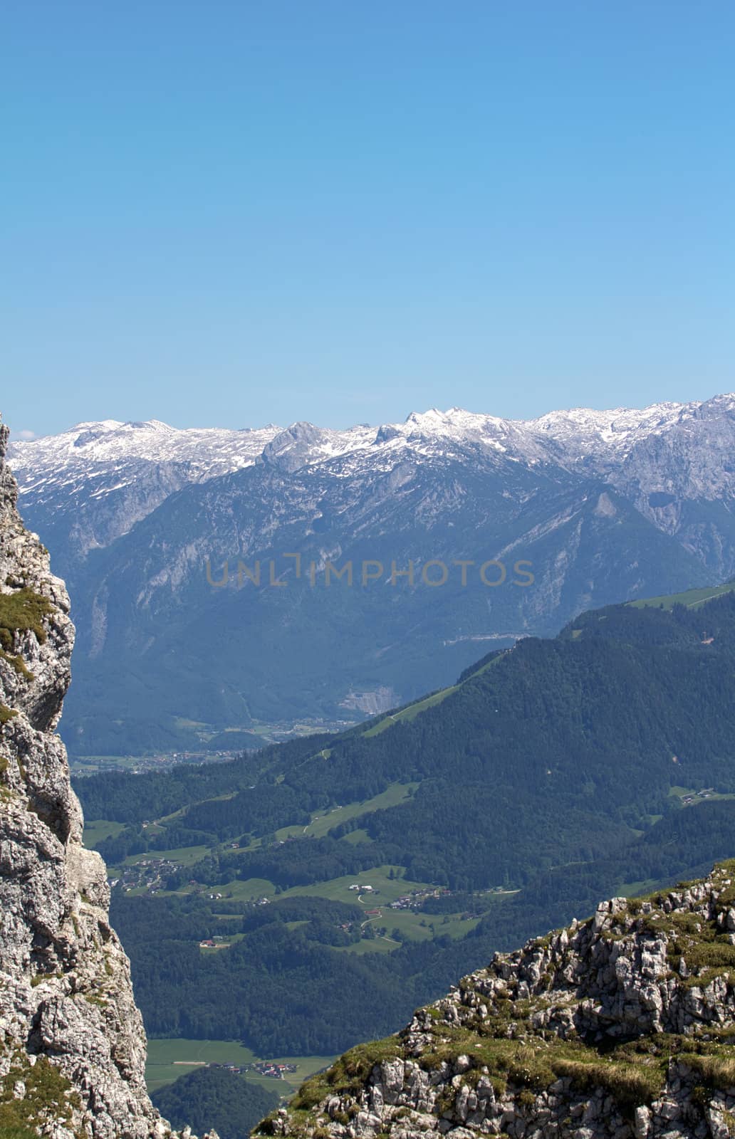 The Alpine mountains of Austria below the warm sun of summer