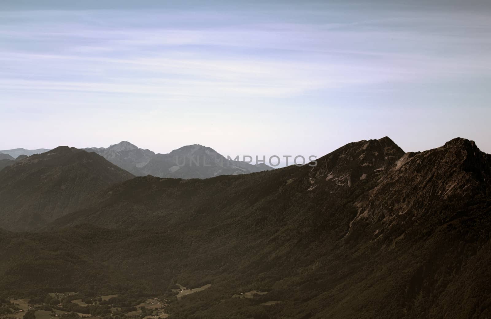 The Alpine mountains of Austria below the warm sun of summer
