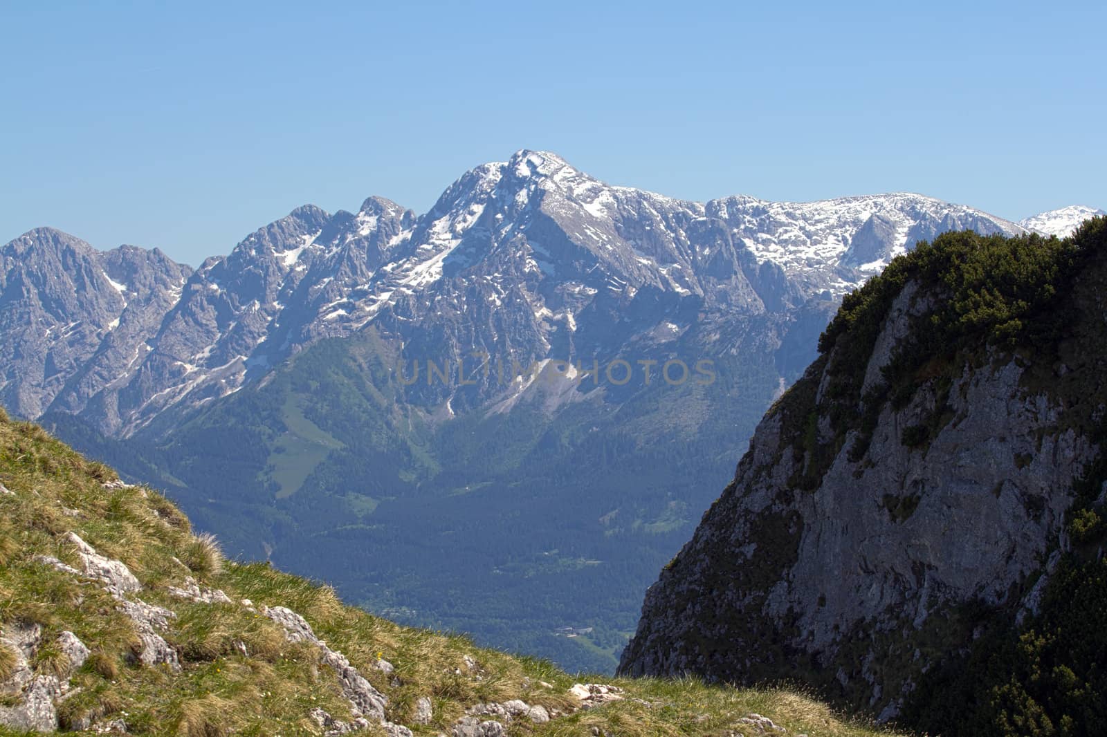 The Alpine mountains of Austria below the warm sun of summer