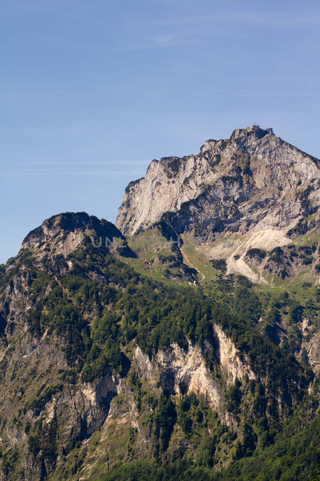 The Alpine mountains of Austria below the warm sun of summer