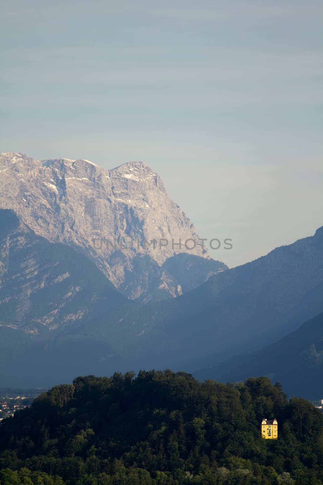 The Alpine mountains of Austria below the warm sun of summer