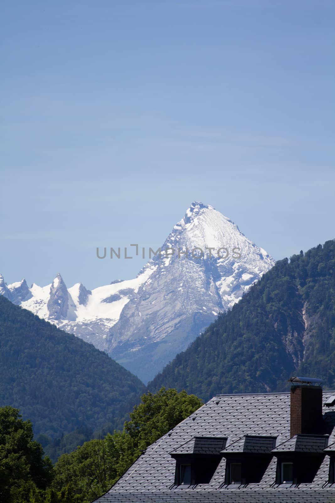 The Alpine mountains of Austria below the warm sun of summer