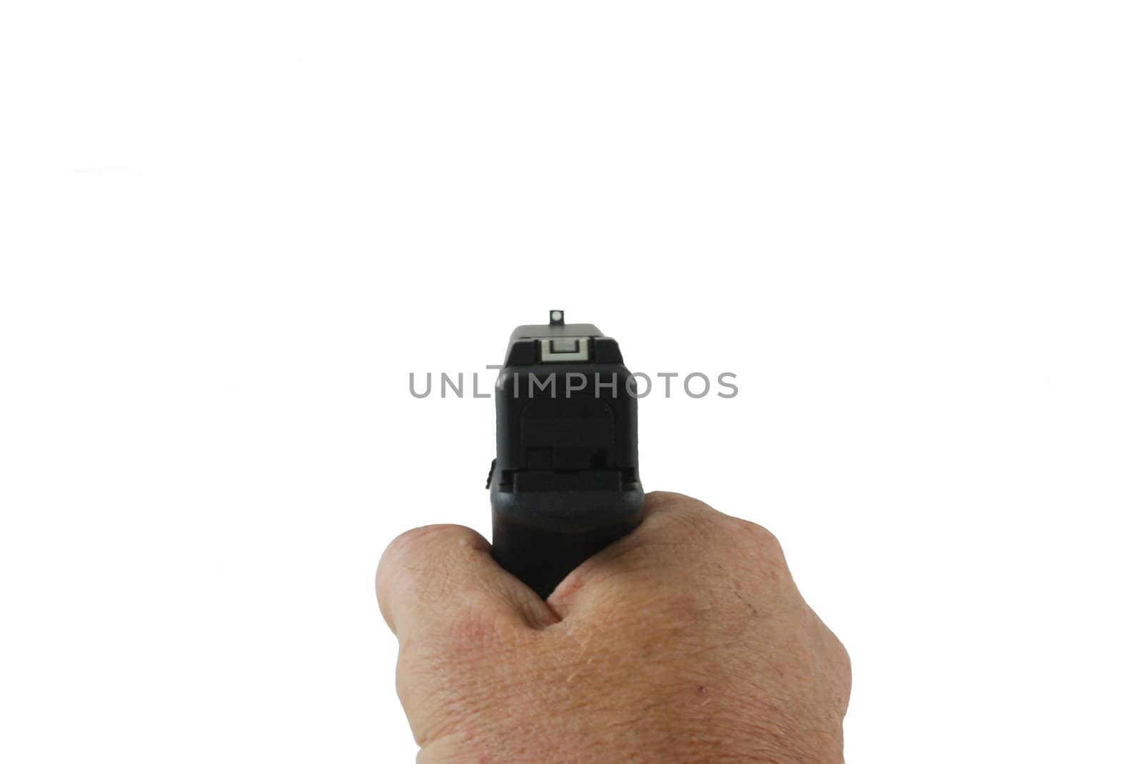 An isolated shooters view amaing a handgun