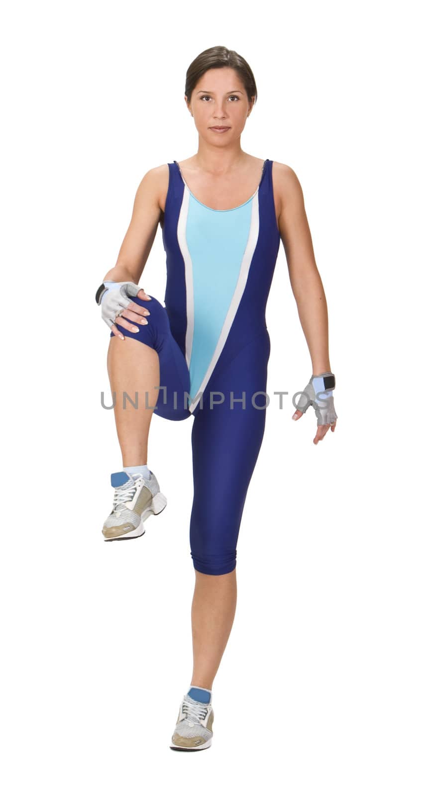Young woman doing warming-up exercises against a white background.