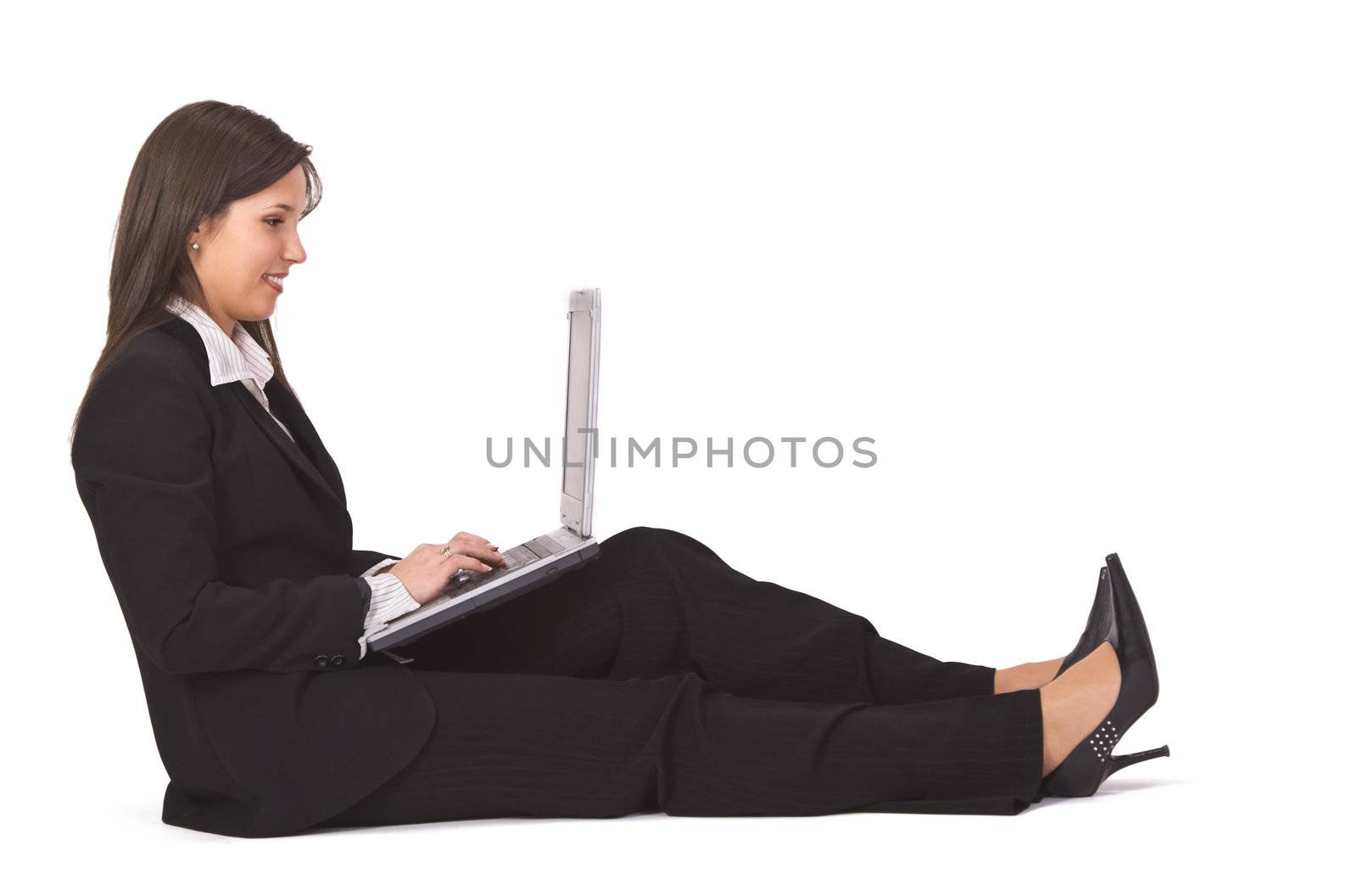 Young businesswoman working on a laptop.