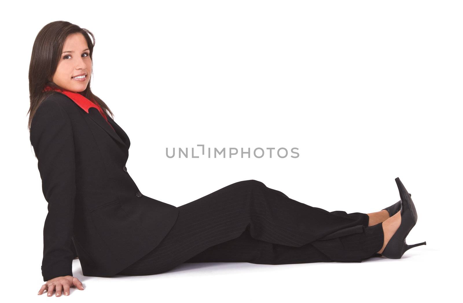 Young elegant woman sitting and smiling. 