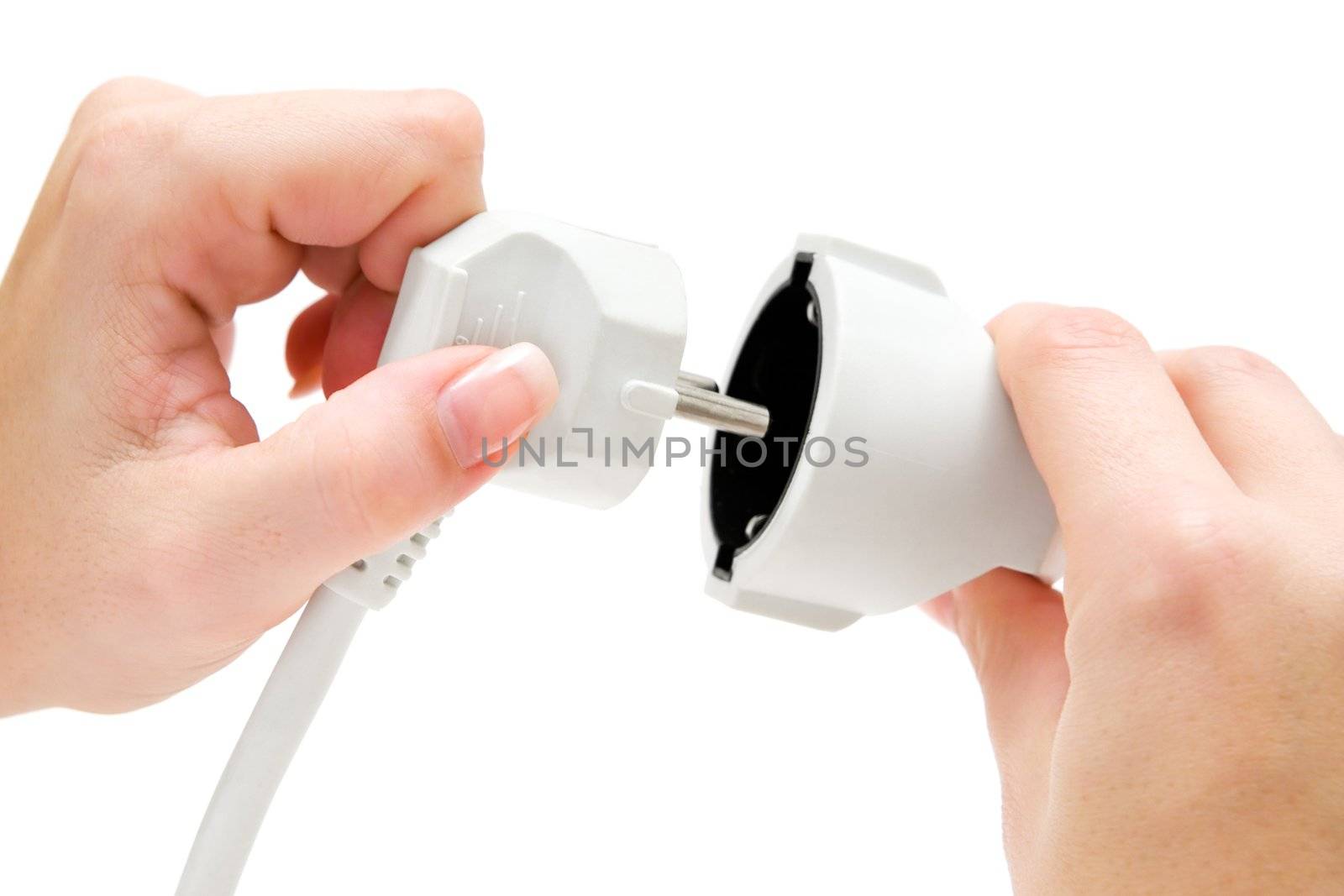 Woman connecting a white extension cable. Isolated on a white background.