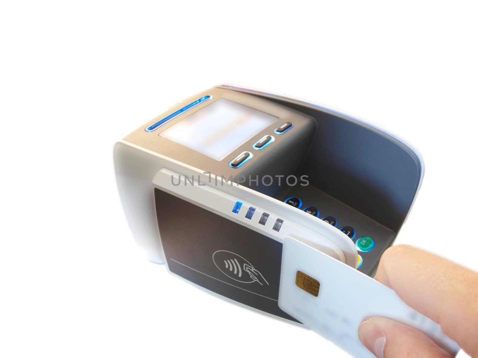 Someone holding a chip card against a payment terminal