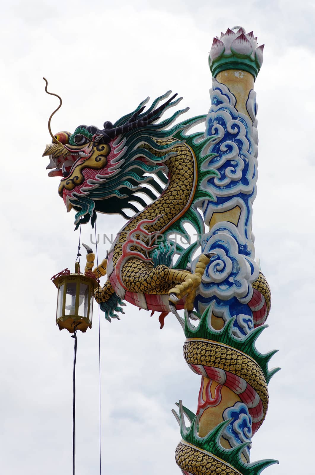 Dragon in chinese temple with white sky