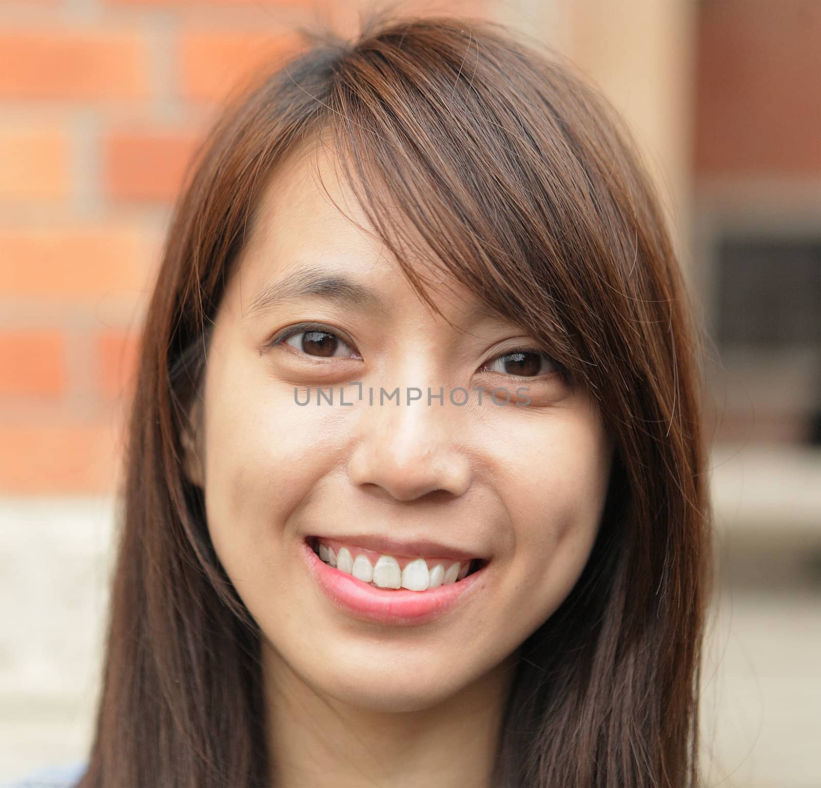 young woman smiling friendly