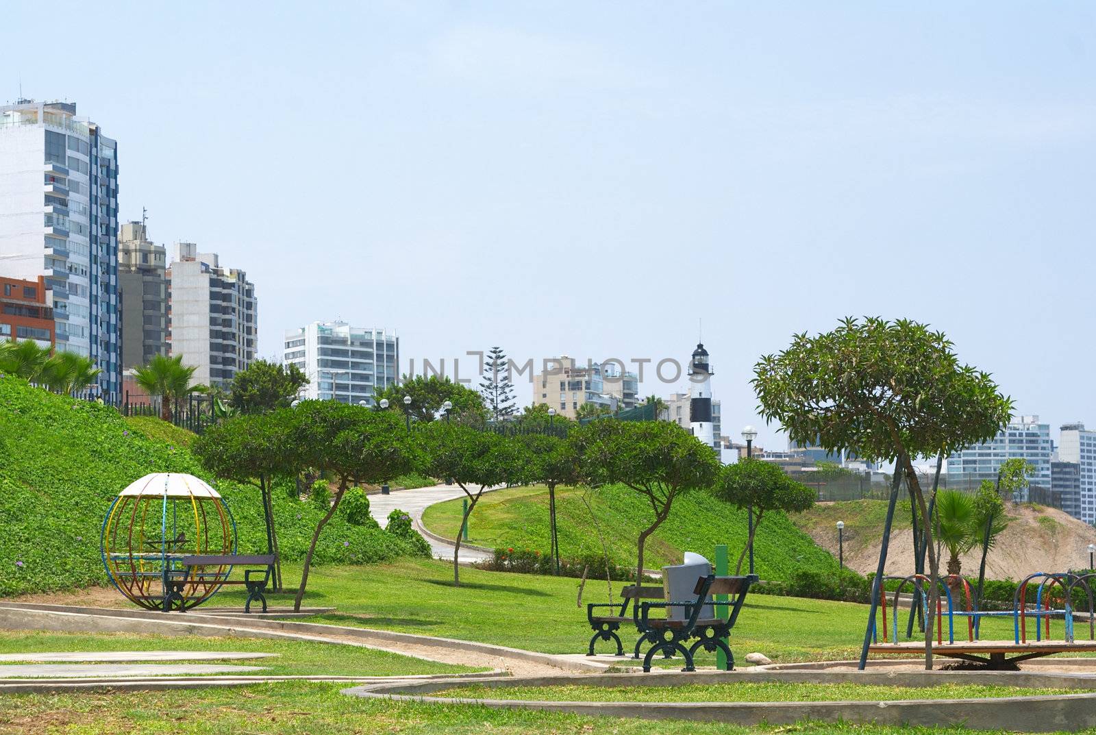 Park and Buildings on the Coast of Lima, Peru by ildi