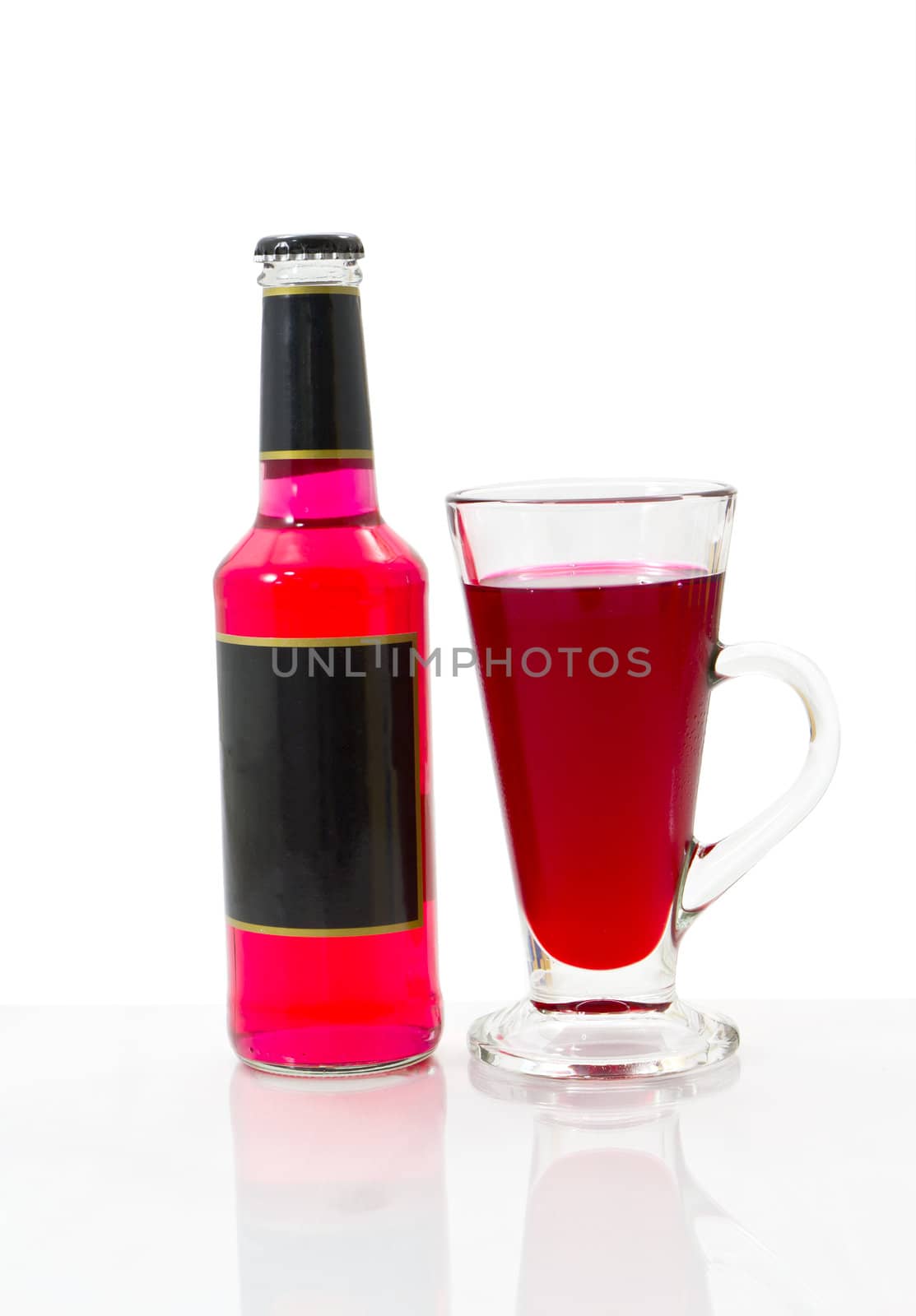 Red wine bottles and wine glass isolated on white.