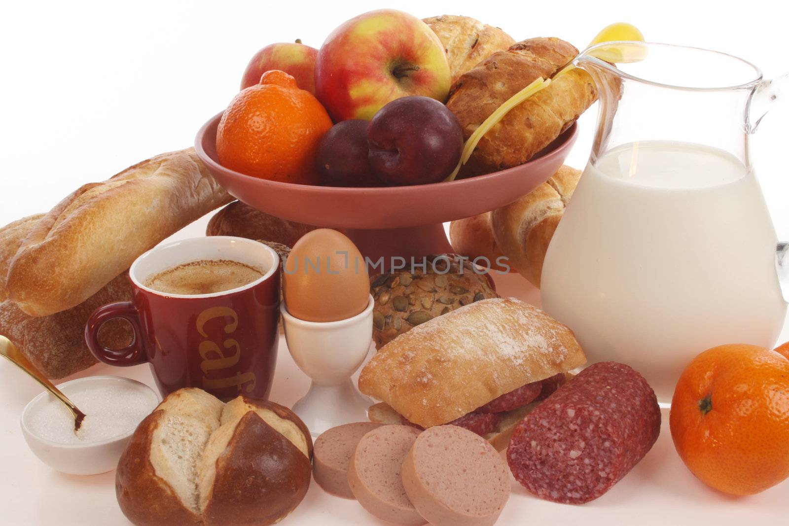 Various bread rolls against a white background